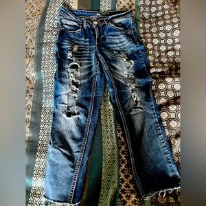 Ripped mid rise denim jeans